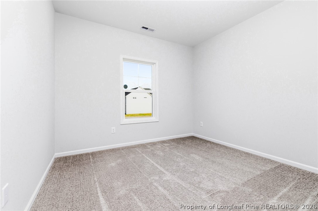 5421 Short Leaf (lot 109) Road Raeford, NC 28376 - Photo 9 of 29 an empty room with windows