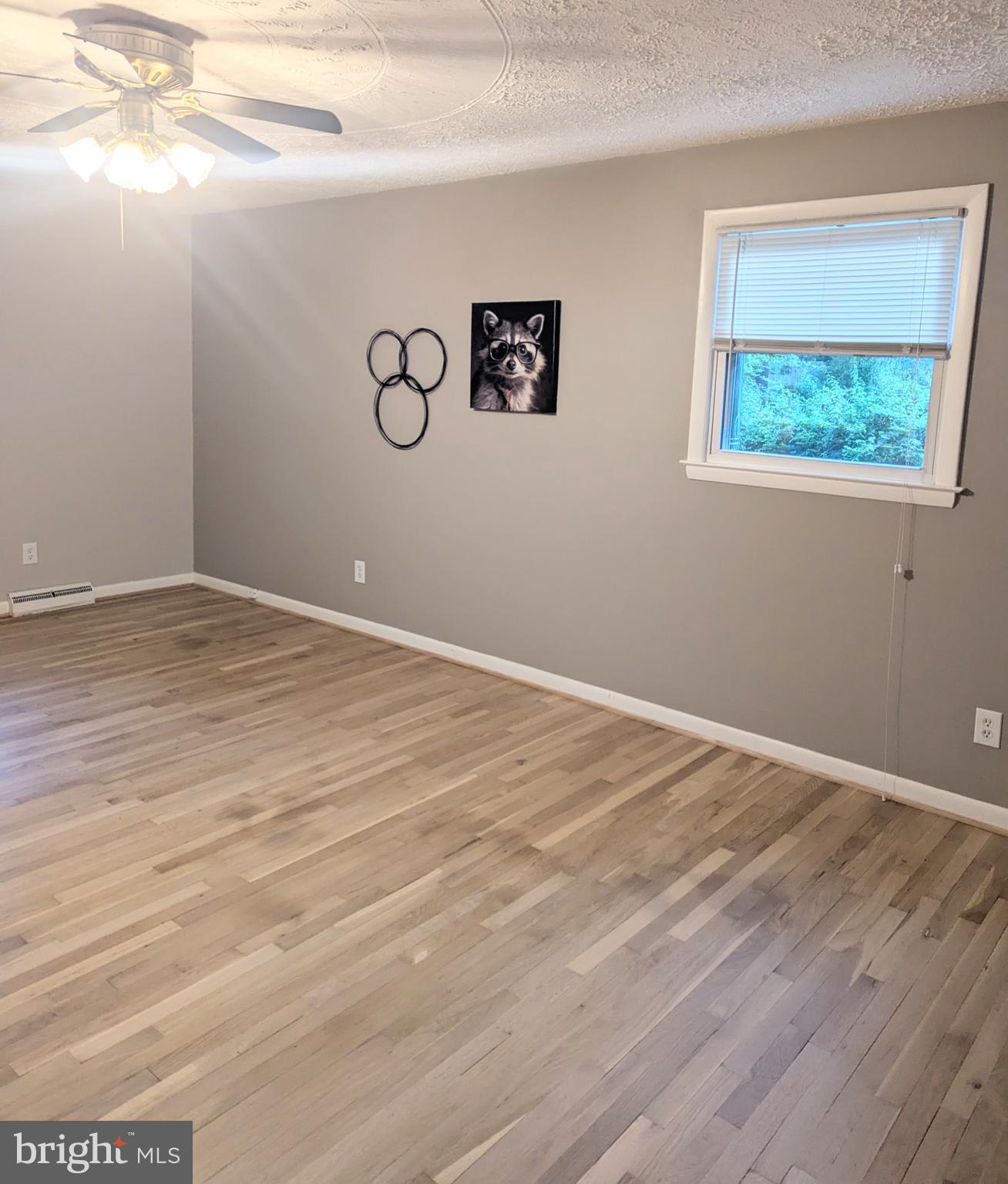 1712 Forestville Road Edgewater, MD 21037 - Photo 11 of 31 a view of an empty room with wooden floor