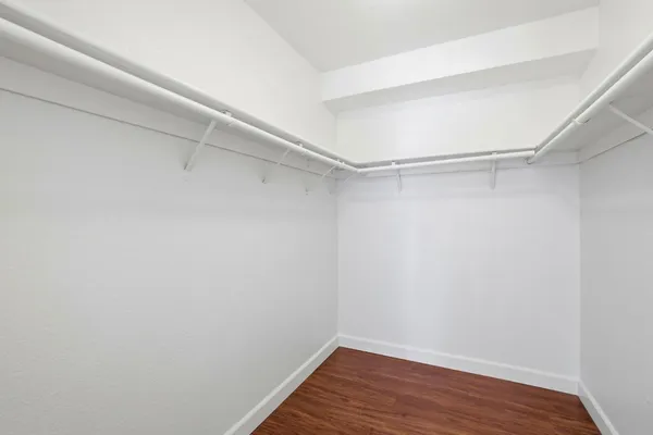 a view of an empty walk in closet