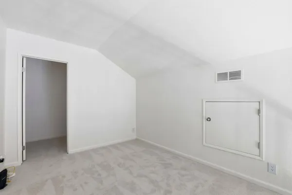 an empty room with an entryway