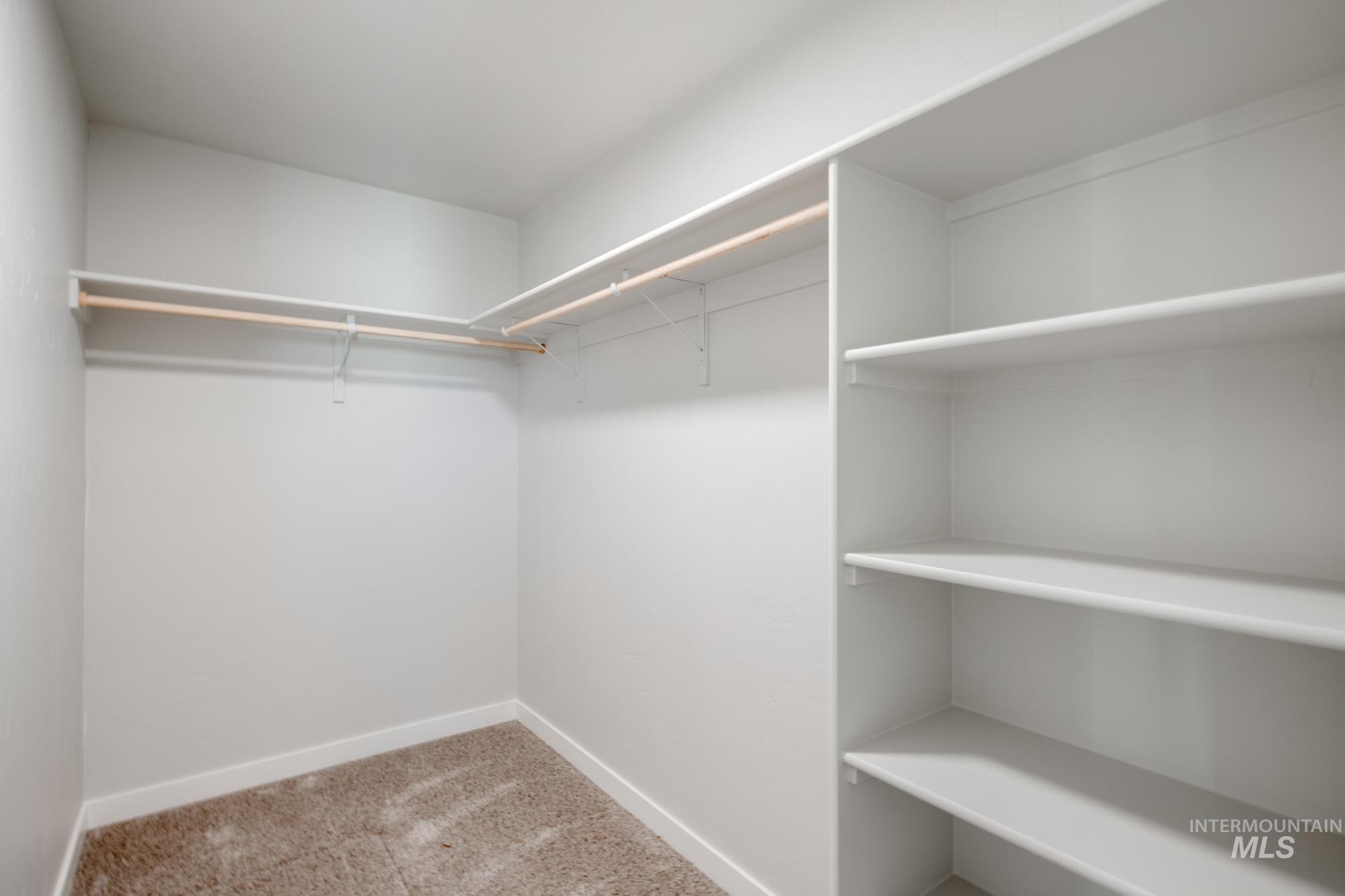 3310 South Maple Rnch Way Nampa, ID 83686 - Photo 17 of 19 Spacious closet featuring light colored carpet