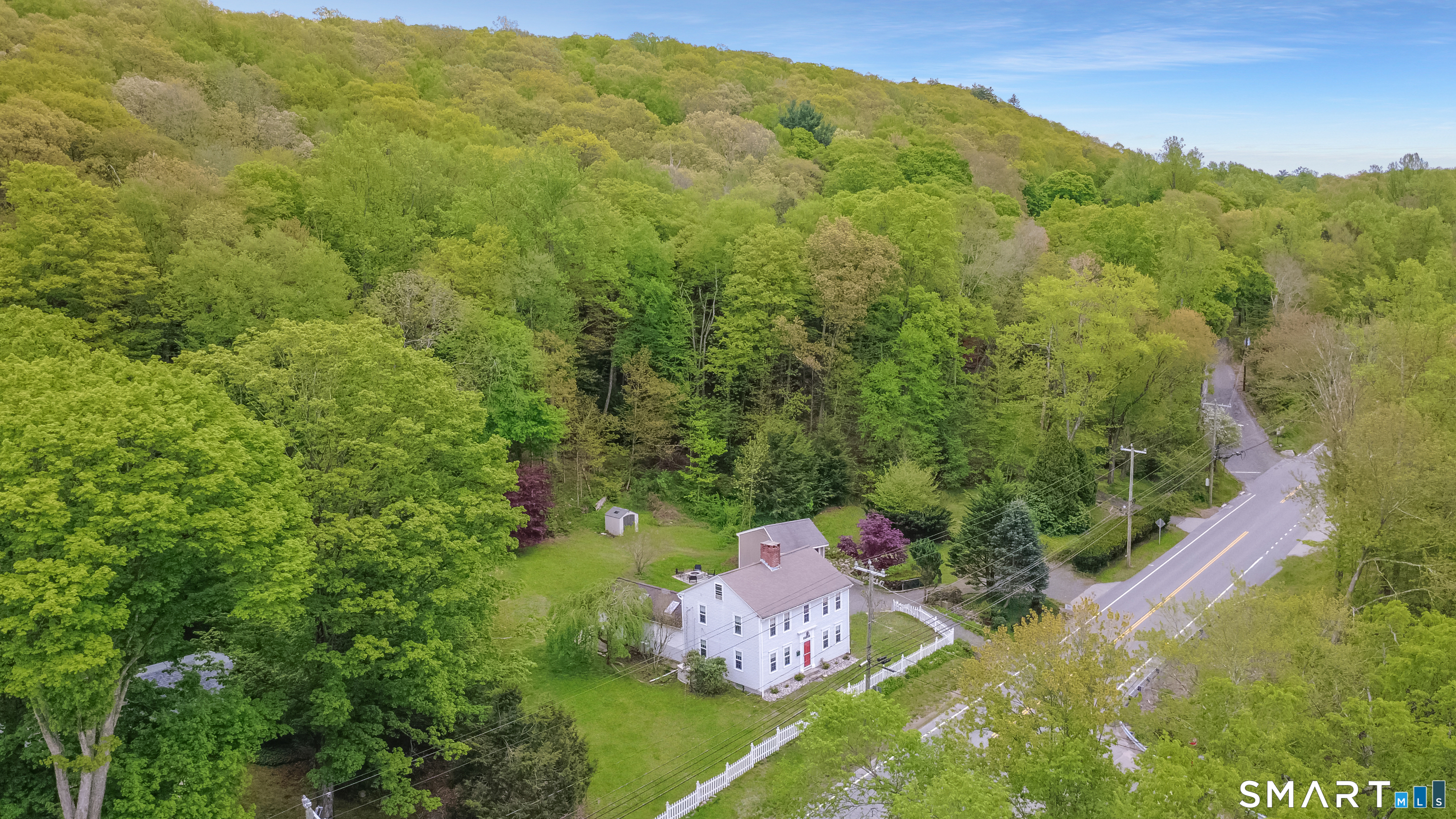 230 Killingworth Road Haddam, CT 06441 - Photo 2 of 36 a backyard of a house with lots of green space