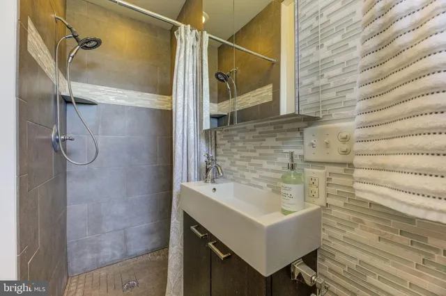 a bathroom with a toilet and a sink