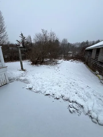 a view of a road with a snow on the road