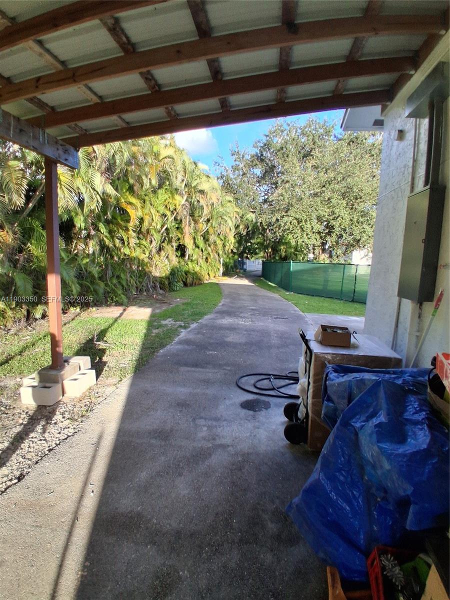 Southwest Ranches Southwest Ranches, FL 33331 - Photo 14 of 15 a view of a porch with furniture and a yard