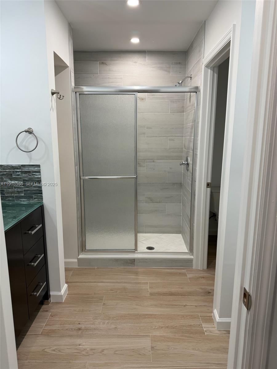 Southwest Ranches Southwest Ranches, FL 33331 - Photo 8 of 15 a bathroom with a shower and a mirror