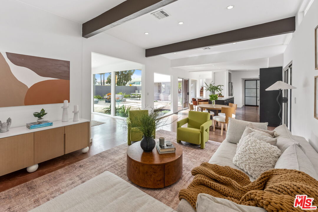 1680 Virginia Road Los Angeles, CA 90019 - Photo 16 of 51 a living room with furniture and a large window