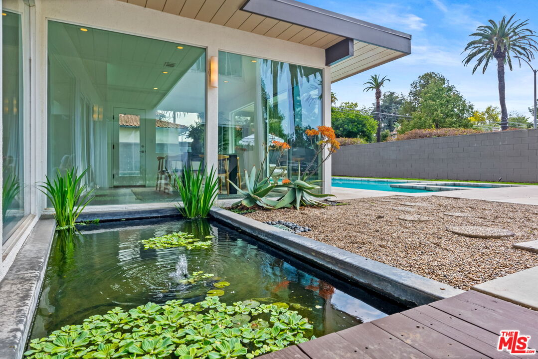 1680 Virginia Road Los Angeles, CA 90019 - Photo 39 of 51 a view of swimming pool with a patio