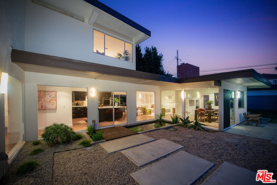 1680 Virginia Road Los Angeles, CA 90019 - Photo 50 of 51 a front view of a house with a yard