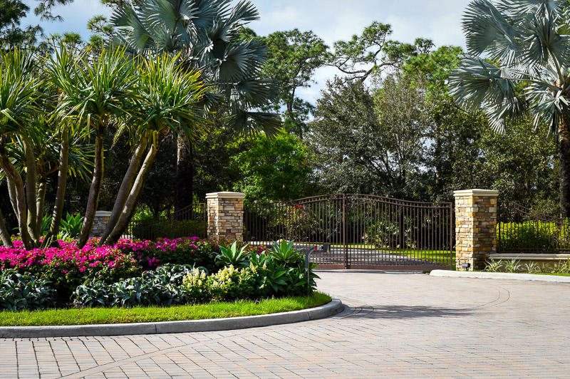 19700 Mack Dairy Road Jupiter, FL 33478 - Photo 6 of 48 a park view with potted plants and large trees