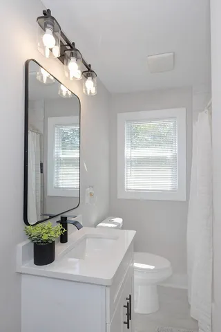 a view of a small space with wooden floor