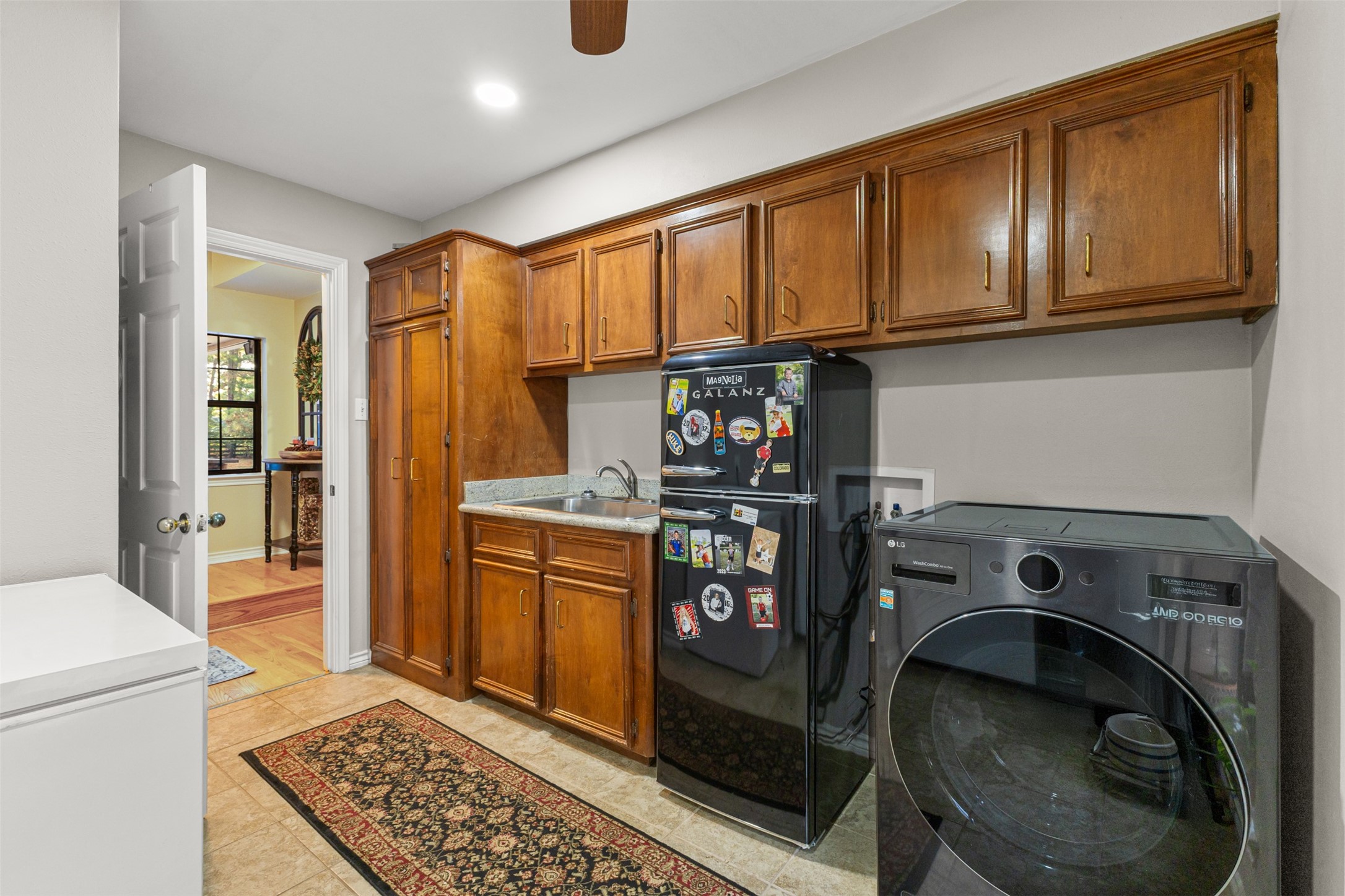 31928 Reids Prairie Road Waller, TX 77484 - Photo 18 of 49 a utility room with dryer and washer