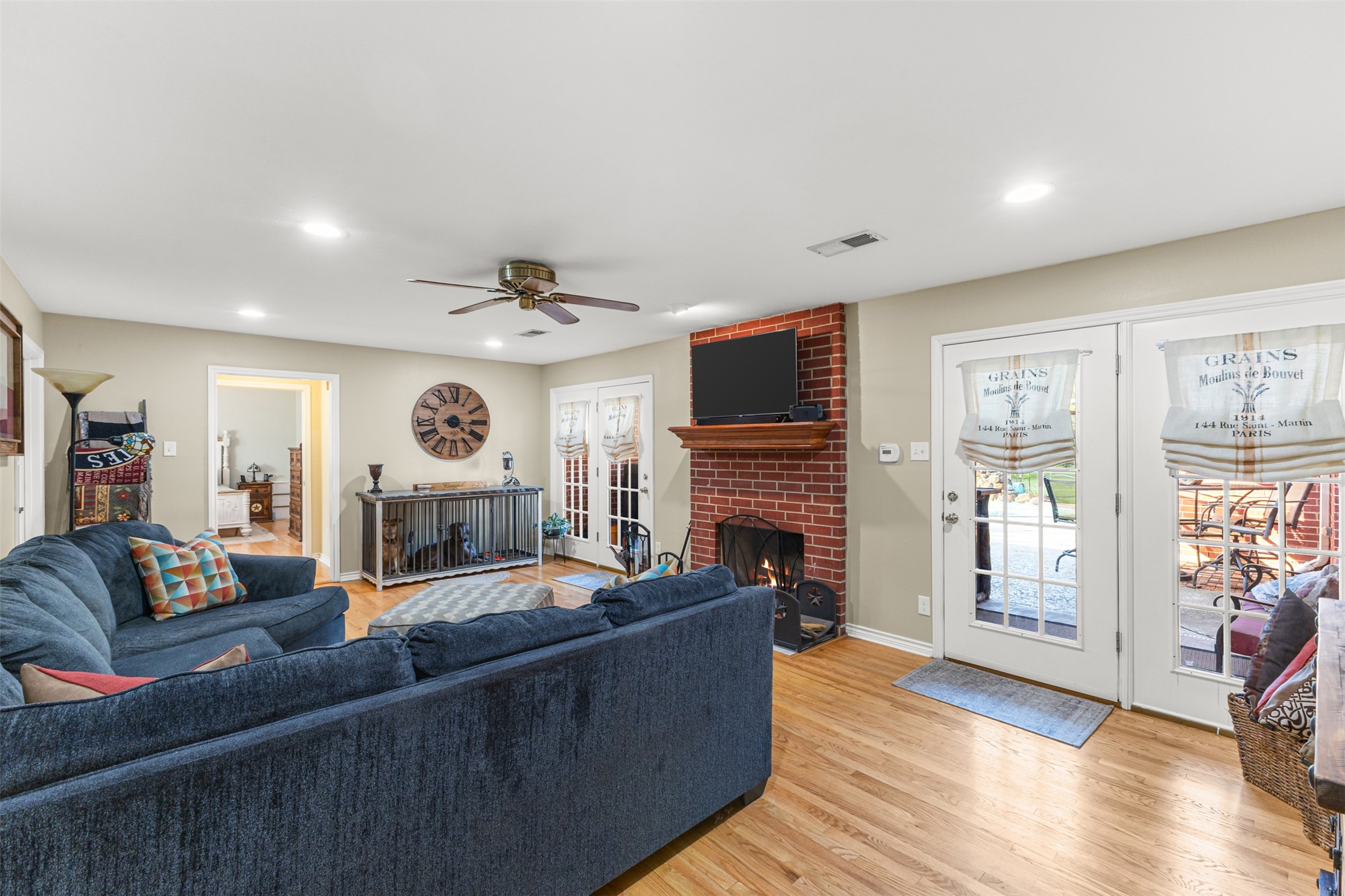 31928 Reids Prairie Road Waller, TX 77484 - Photo 20 of 49 a living room with fireplace furniture and a flat screen tv