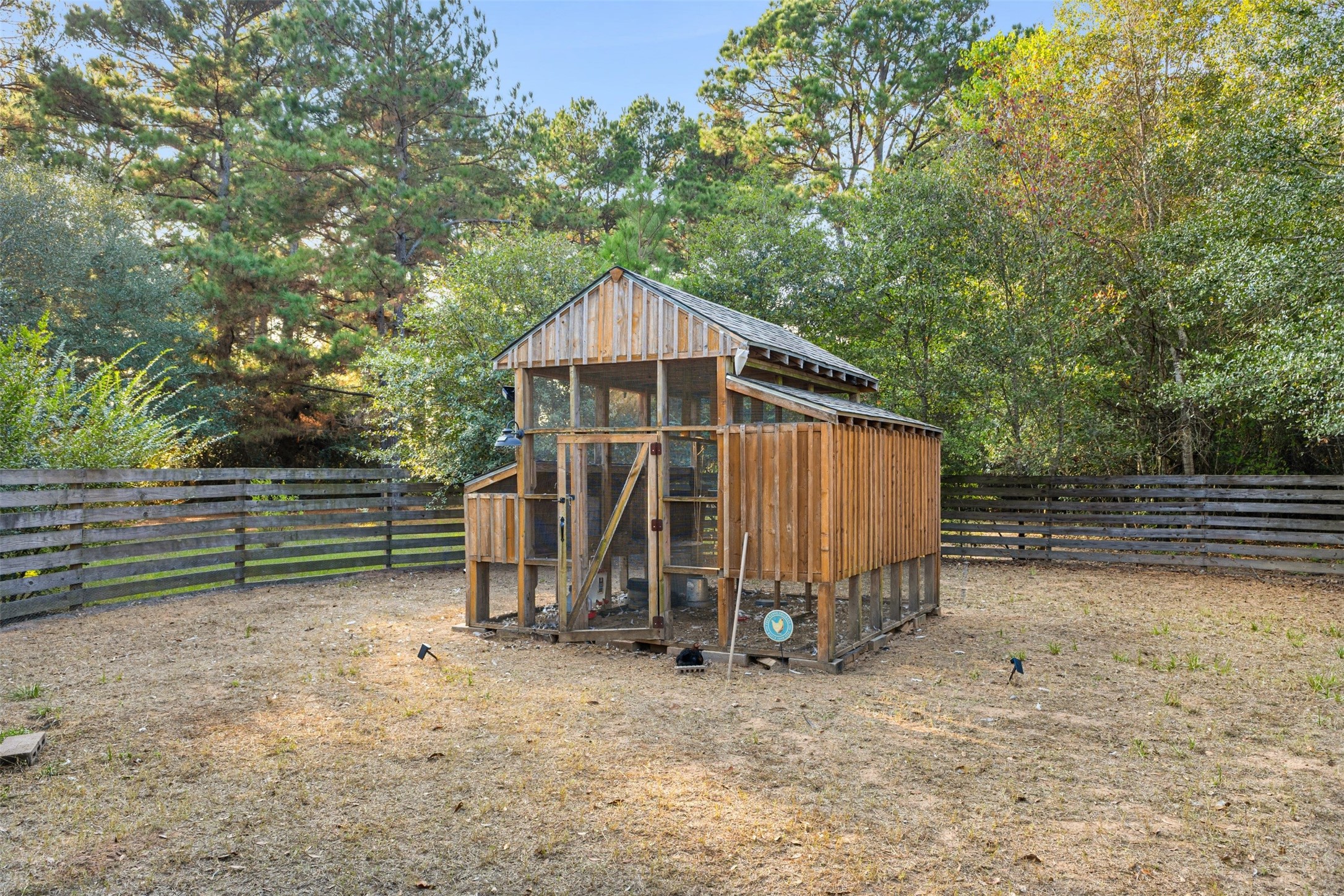 31928 Reids Prairie Road Waller, TX 77484 - Photo 42 of 49 a view of a small house with a backyard