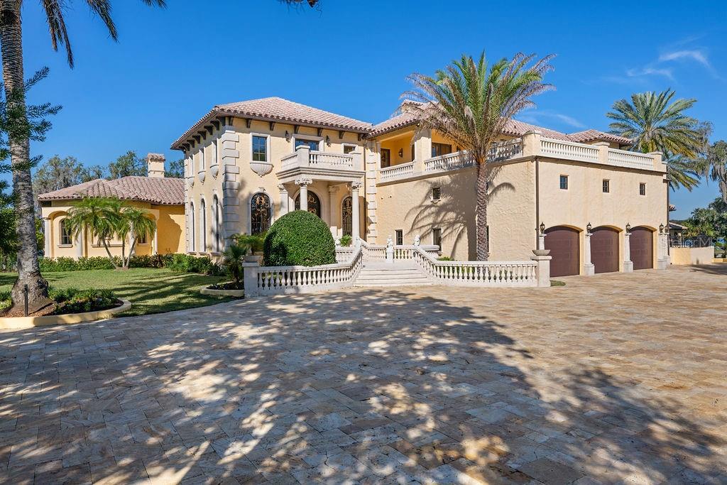 4200 Down Point Lane Windermere, FL 34786 - Photo 12 of 63 a front view of a house with a yard