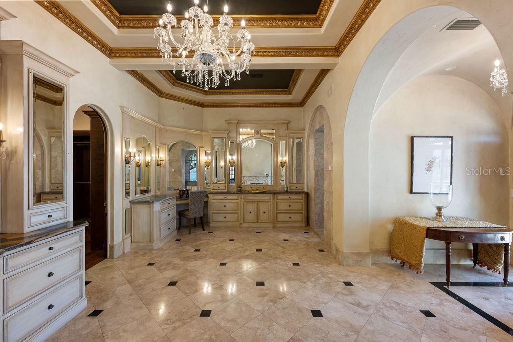 4200 Down Point Lane Windermere, FL 34786 - Photo 27 of 63 a view of a hallway with chandelier