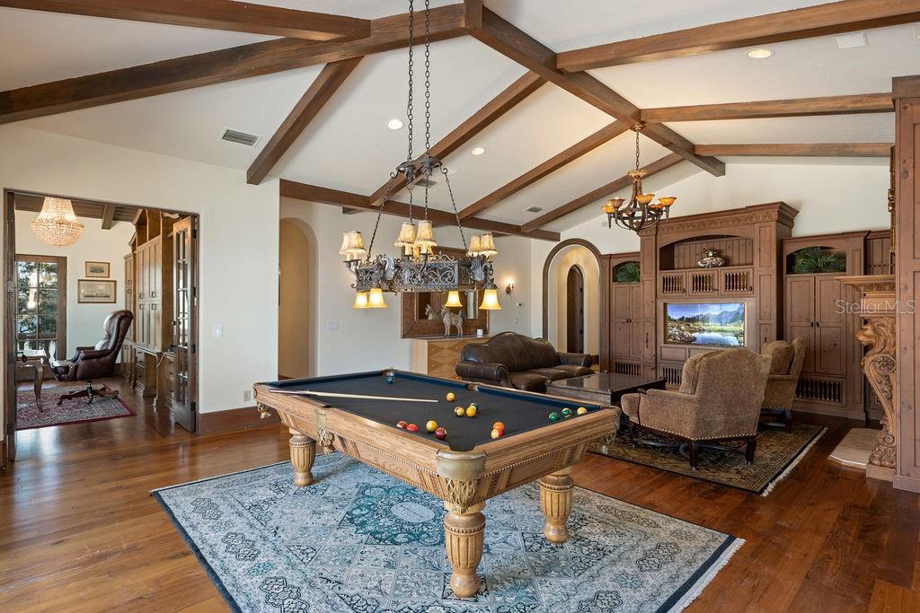 4200 Down Point Lane Windermere, FL 34786 - Photo 46 of 63 a living room with furniture and wooden floor