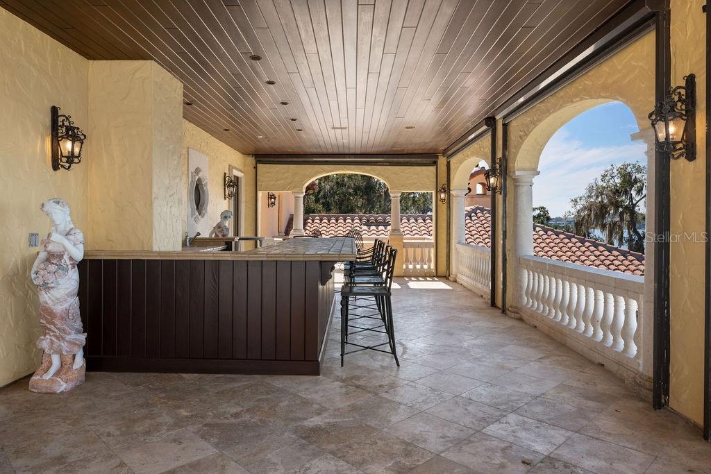 4200 Down Point Lane Windermere, FL 34786 - Photo 56 of 63 a view of a porch with furniture