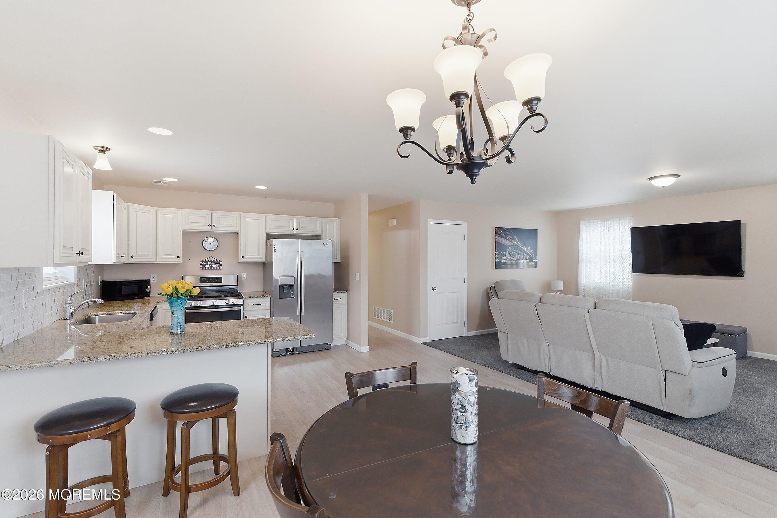 636 Chelsea Street Forked River, NJ 08731 - Photo 9 of 24 12-Dining to Kitchen and Living