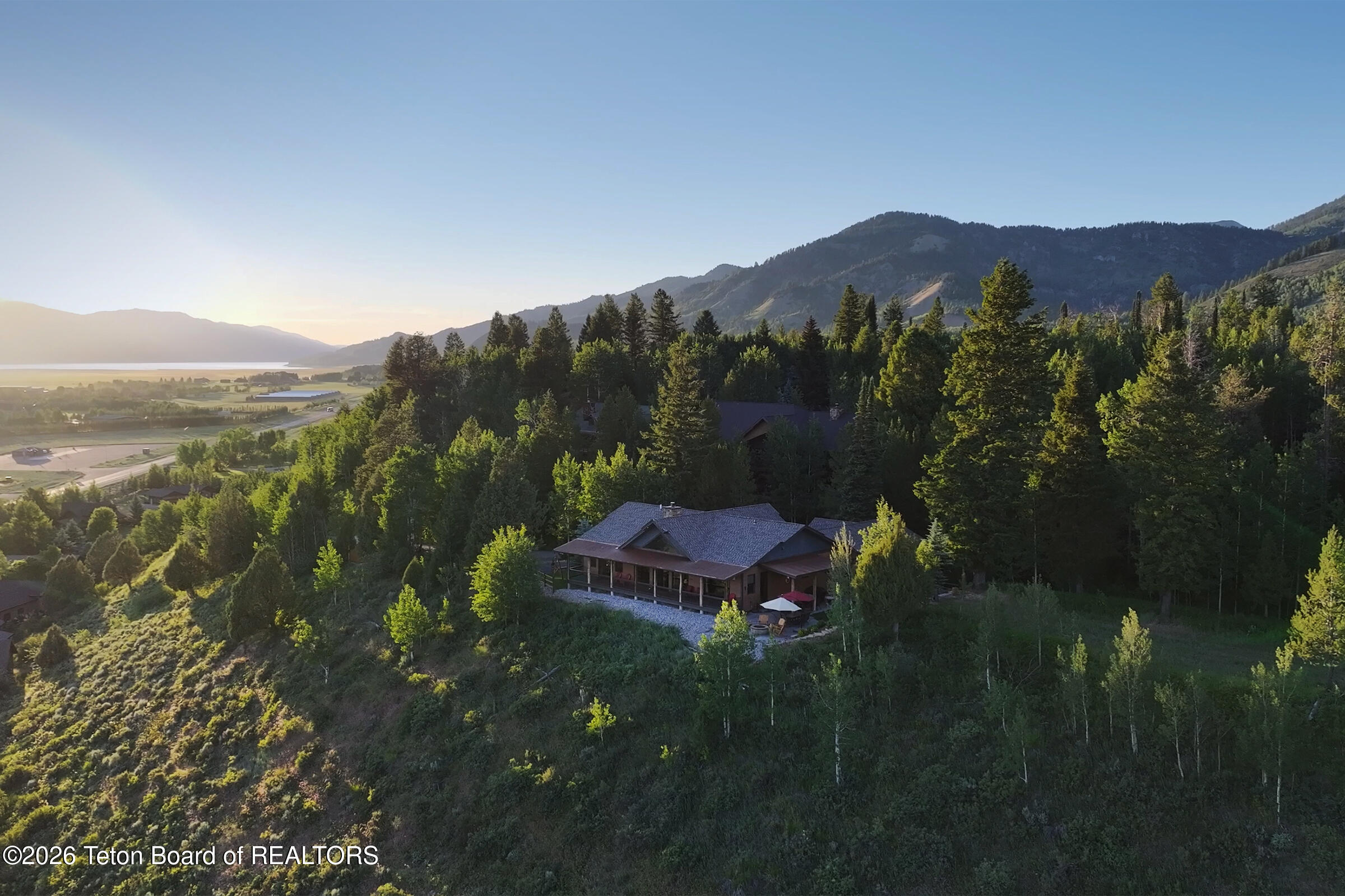 166 Aspen Ridge Trail Alpine, WY 83128 - Photo 3 of 50 1_166_Aspen_Ridge_Trail_DroneLake