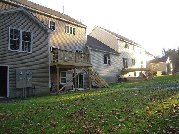 Lot 2 Liberty Square Road, Unit 1 Boxborough, MA 01719 - Photo 9 of 12 a view of a yard in front of a house