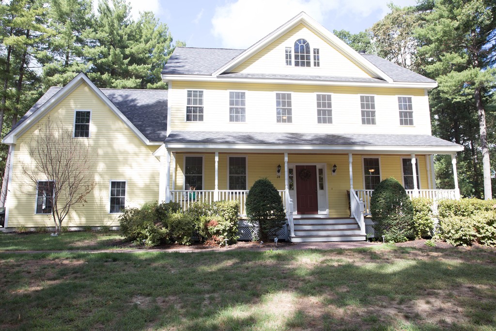 24 Zina Road Hudson, MA 01749 - Photo 1 of 25 a front view of a house with a yard
