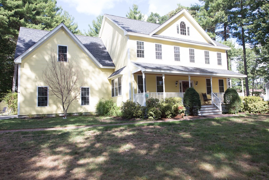 24 Zina Road Hudson, MA 01749 - Photo 7 of 25 a front view of a house with a yard