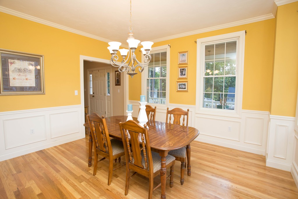 24 Zina Road Hudson, MA 01749 - Photo 10 of 25 a view of a dining room with furniture and chandelier