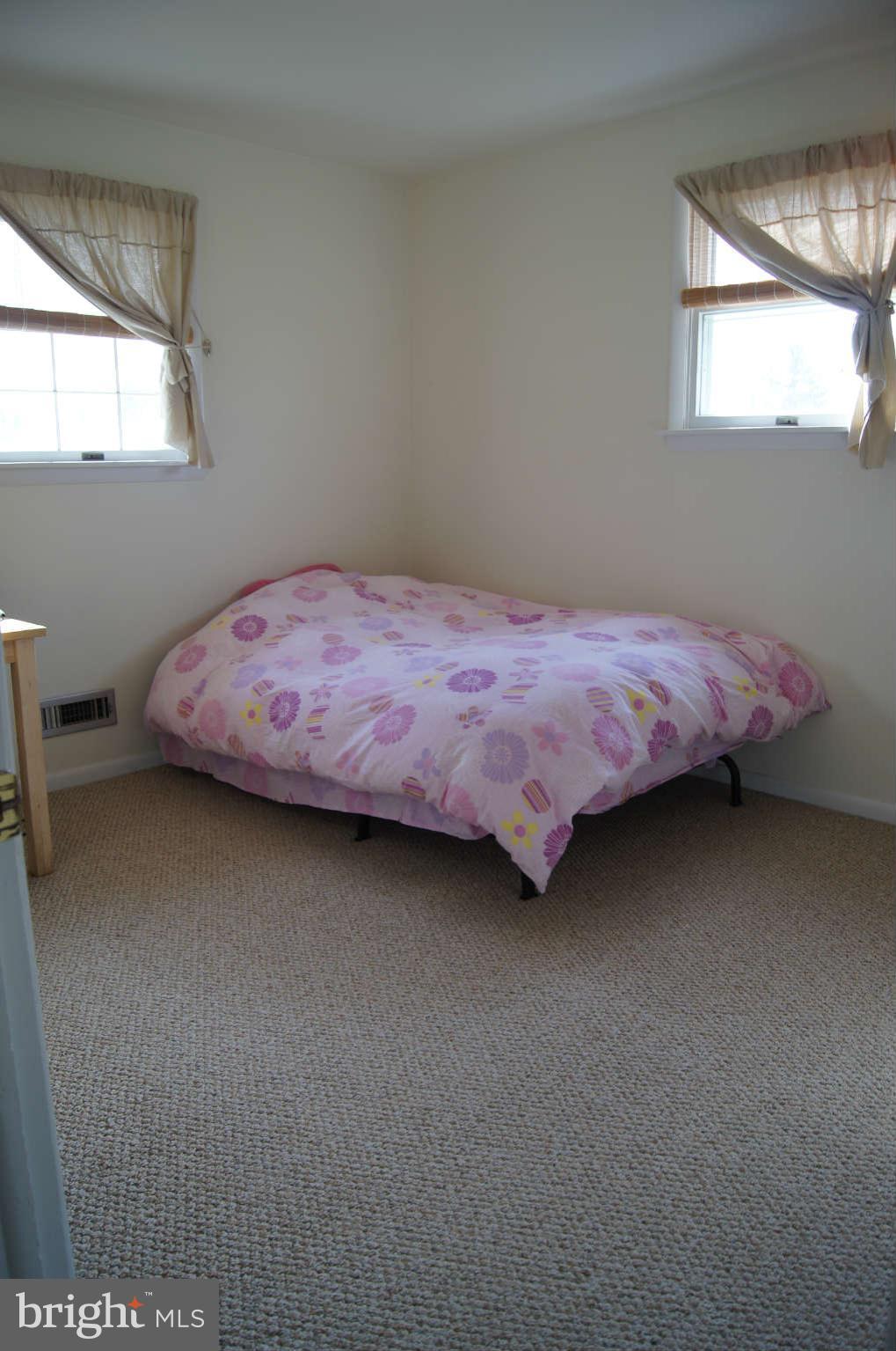 9 Edgemoor Road Timonium, MD 21093 - Photo 14 of 28 Spacious master bedroom with hardwood under carpet