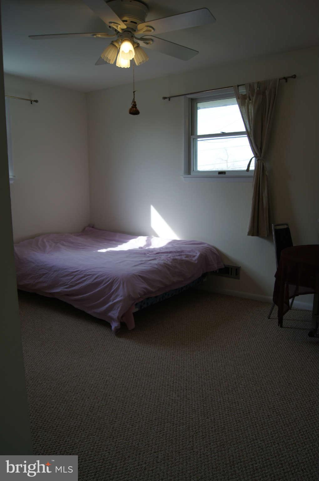 9 Edgemoor Road Timonium, MD 21093 - Photo 18 of 28 Bedroom two with hardwood under carpet