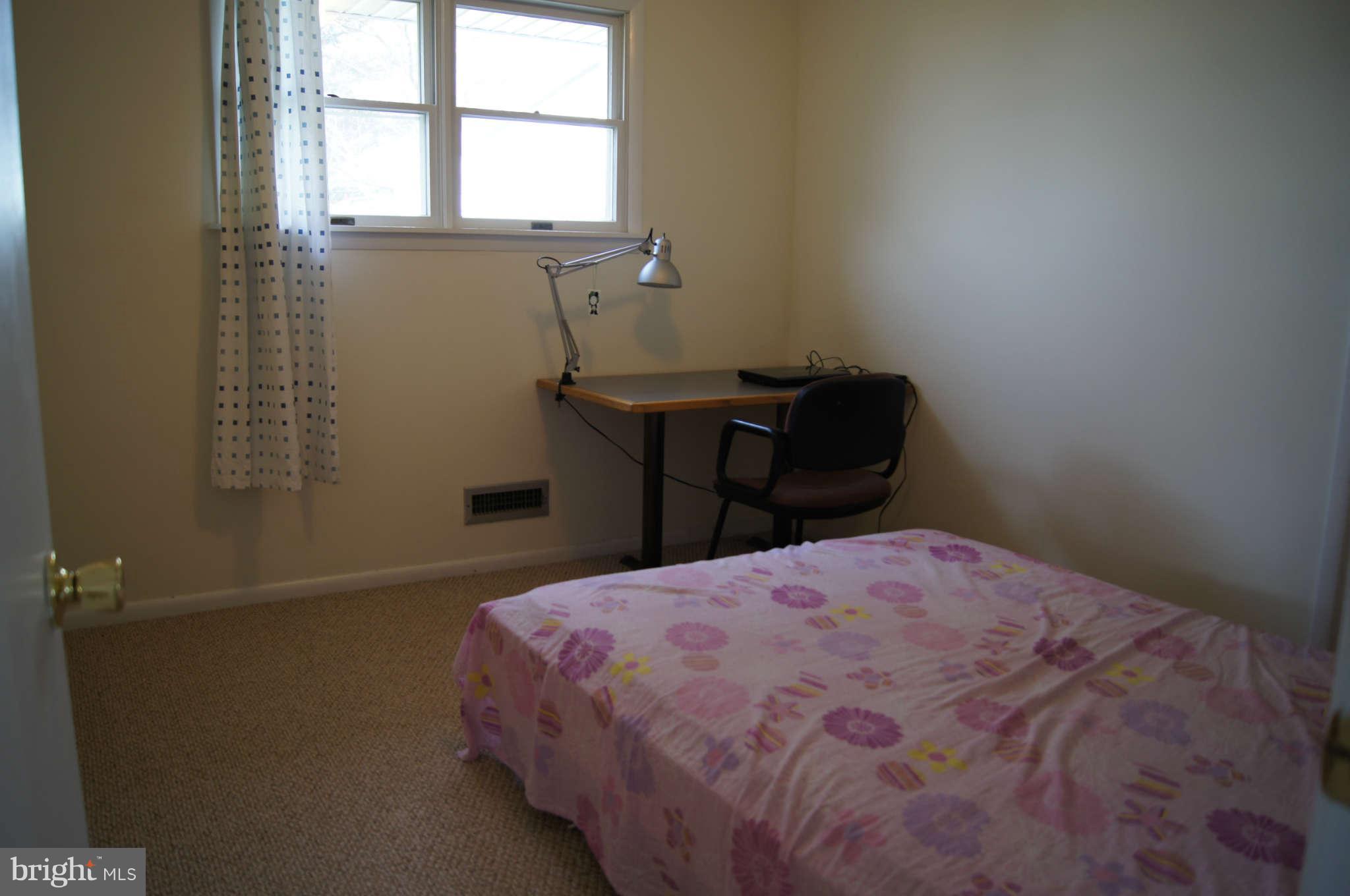 9 Edgemoor Road Timonium, MD 21093 - Photo 19 of 28 Bedroom three with hardwood under carpet
