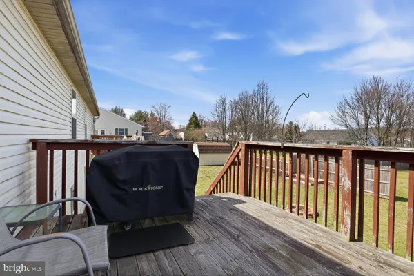 a view of balcony with furniture