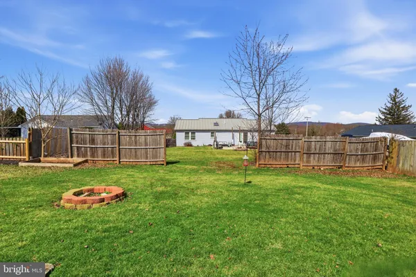 a view of a backyard with a garden