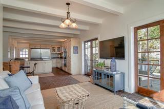 530 Payne Road San Juan Bautista, CA 95045 - Photo 14 of 21 a living room with furniture and a flat screen tv