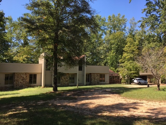 1031 Mt Paran Road Lizella, GA 31052 - Photo 1 of 23 a view of a house with a yard
