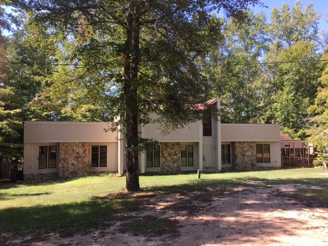 1031 Mt Paran Road Lizella, GA 31052 - Photo 2 of 23 a view of a house with a yard
