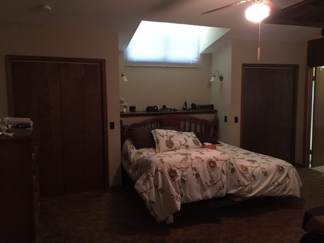 1031 Mt Paran Road Lizella, GA 31052 - Photo 20 of 23 a bedroom with a bed and a mirror