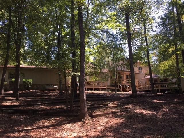1031 Mt Paran Road Lizella, GA 31052 - Photo 3 of 23 a view of street with tree s