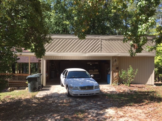 1031 Mt Paran Road Lizella, GA 31052 - Photo 6 of 23 a view of a car park in front of house