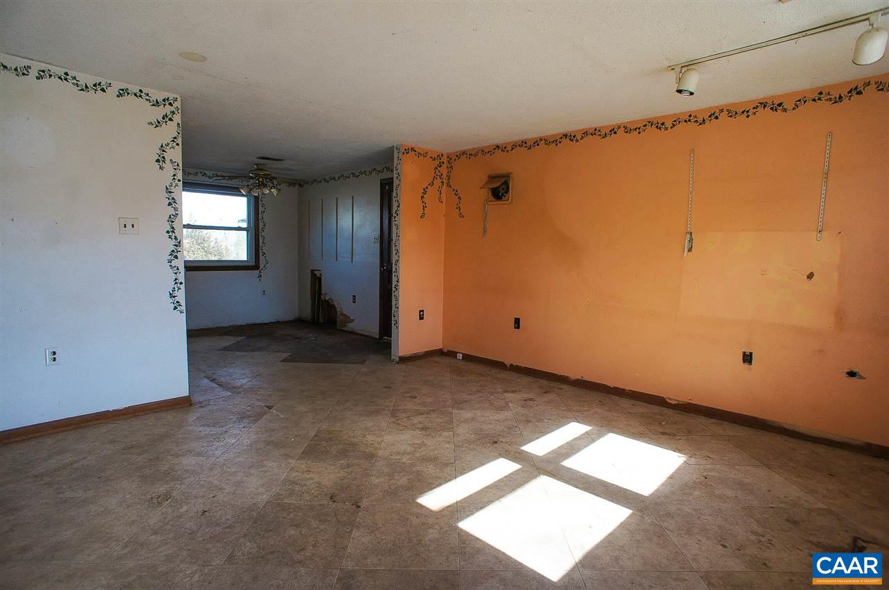 1475 Hunters Lodge Road Troy, VA 22974 - Photo 3 of 12 a view of empty room with window