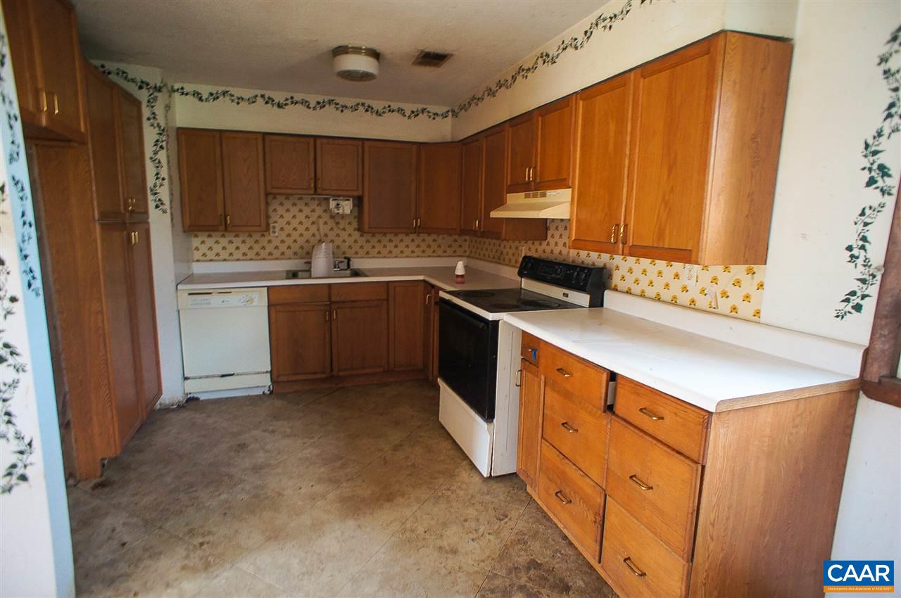 1475 Hunters Lodge Road Troy, VA 22974 - Photo 5 of 12 a kitchen with stainless steel appliances a sink stove and cabinets