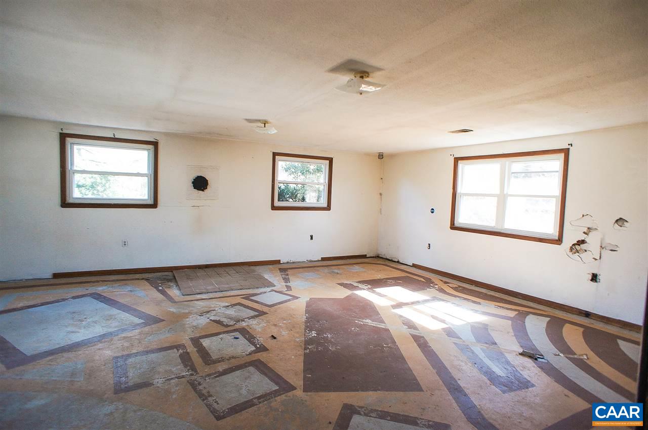 1475 Hunters Lodge Road Troy, VA 22974 - Photo 6 of 12 a view of an empty room and window