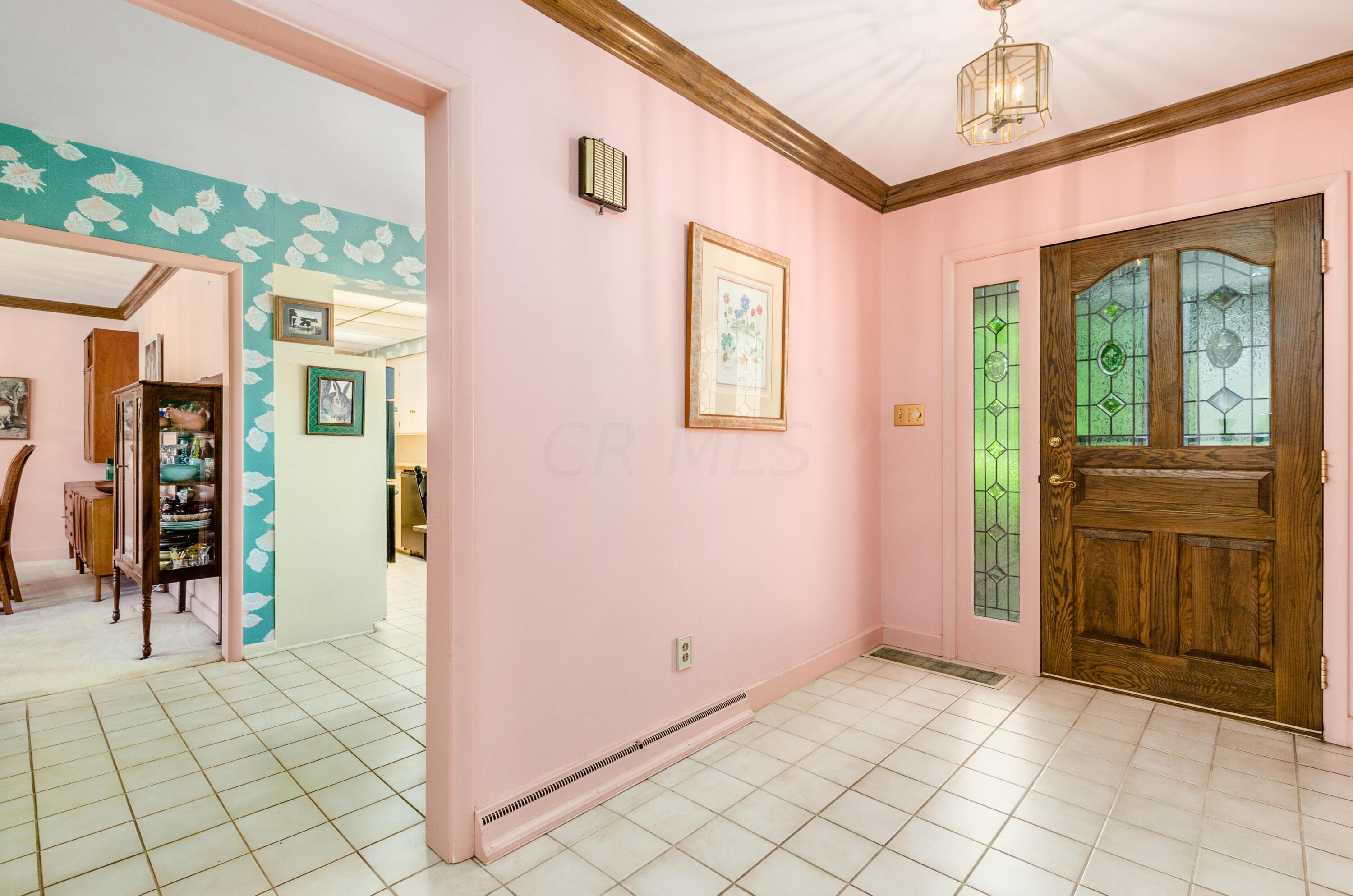 6665 Merwin Road Columbus, OH 43235 - Photo 3 of 58 Foyer with large double closets/ceramic tile floors