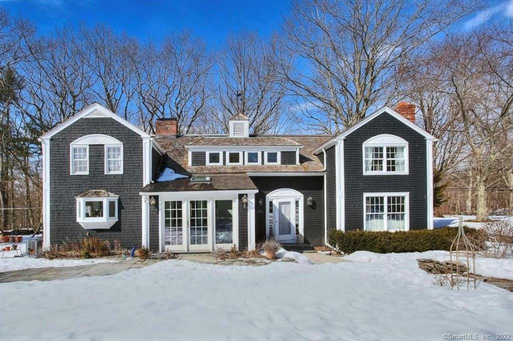 175 Cannon Road Wilton, CT 06897 - Photo 1 of 1 a front view of a house with a yard