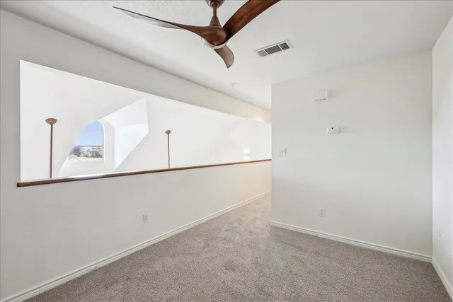 a view of a microwave and cabinet