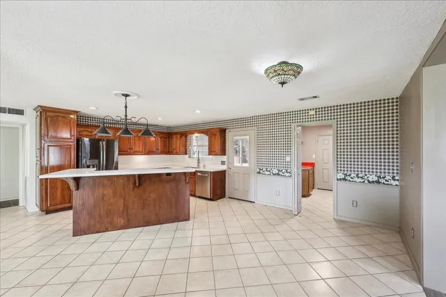 a kitchen with a cabinets and counter space