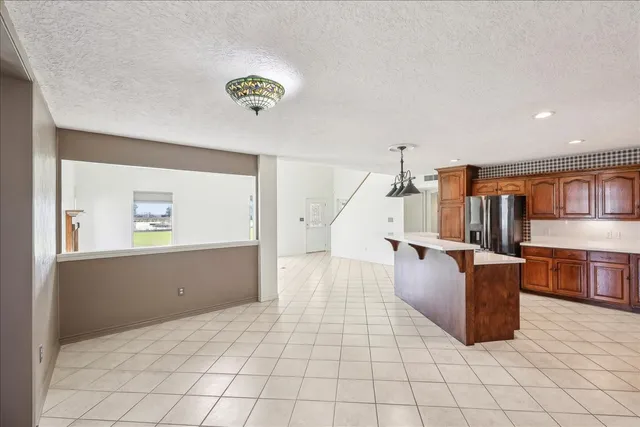 a view of kitchen and hall with furniture