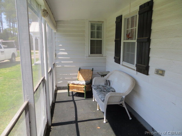 173 Piney Point Road Onemo, VA 23130 - Photo 3 of 14 Screened porch