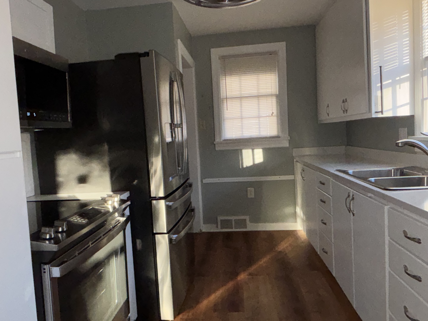 500 South Green Street Anna, IL 62906 - Photo 17 of 30 a kitchen with a refrigerator stove and cabinets
