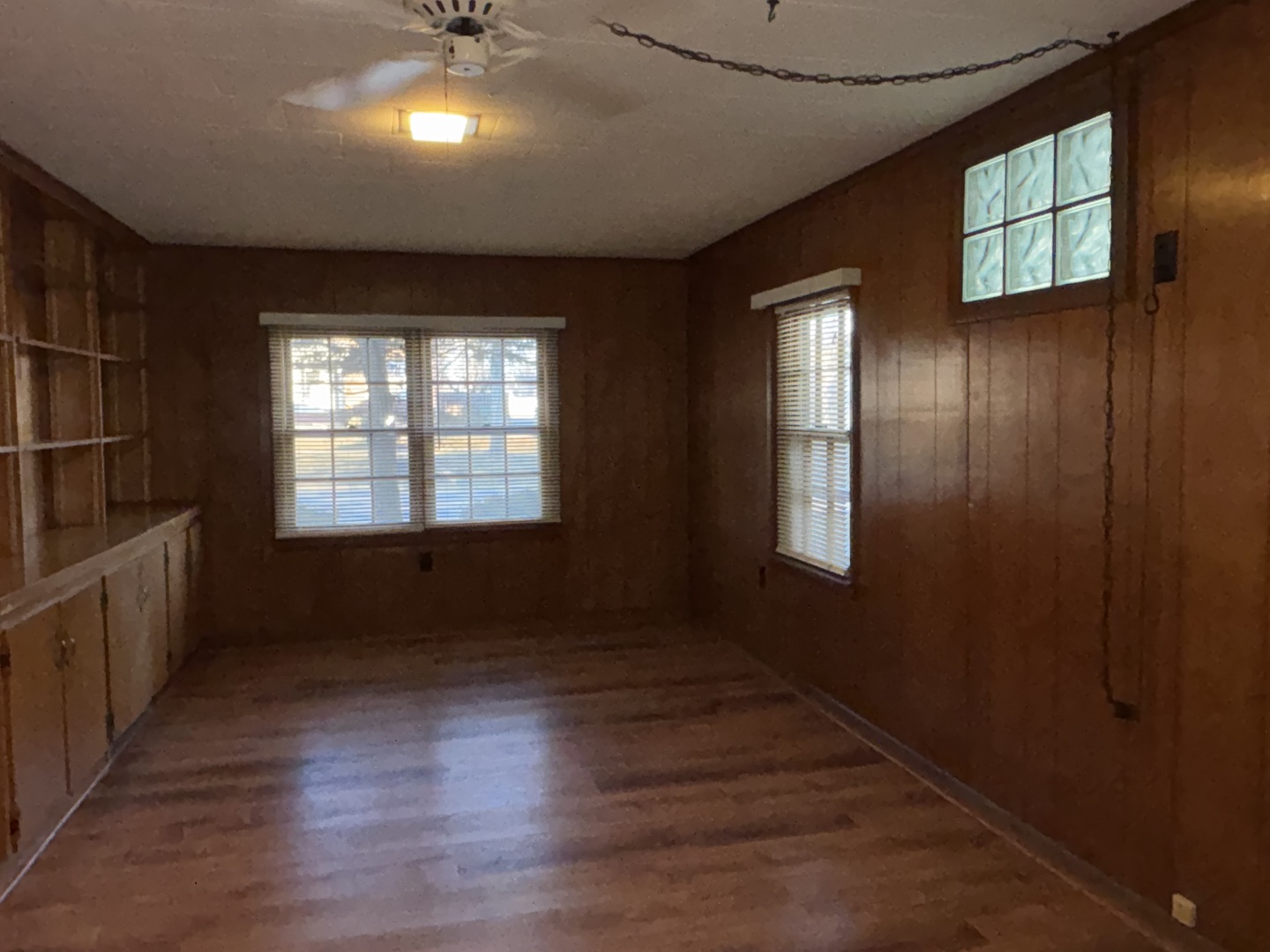 500 South Green Street Anna, IL 62906 - Photo 22 of 30 an empty room with wooden floor and windows